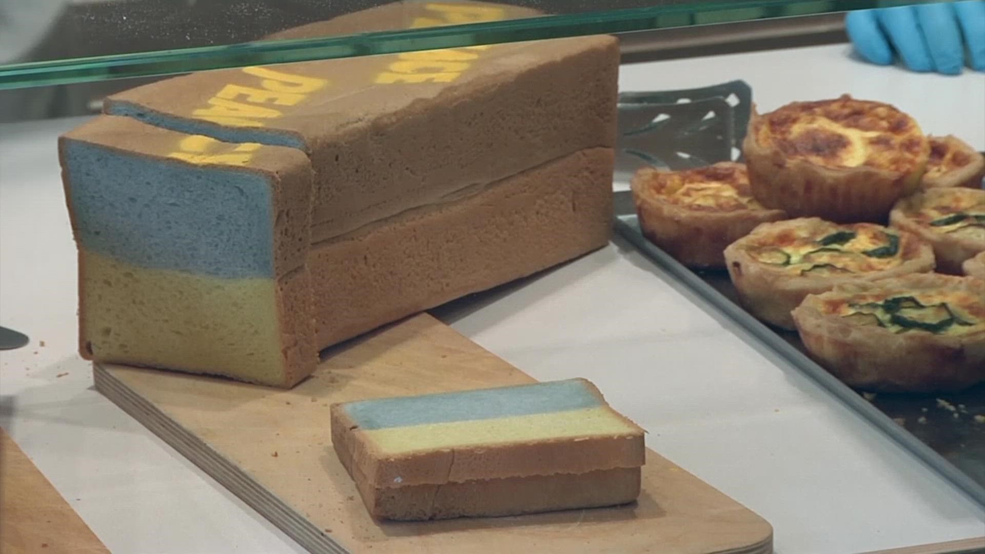 An Italian baker is making blue and yellow colored bread to help refugees fleeing Ukraine.