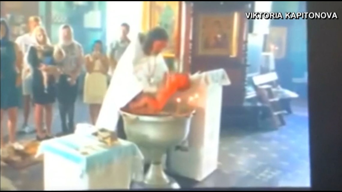 Violent baptism caught on camera