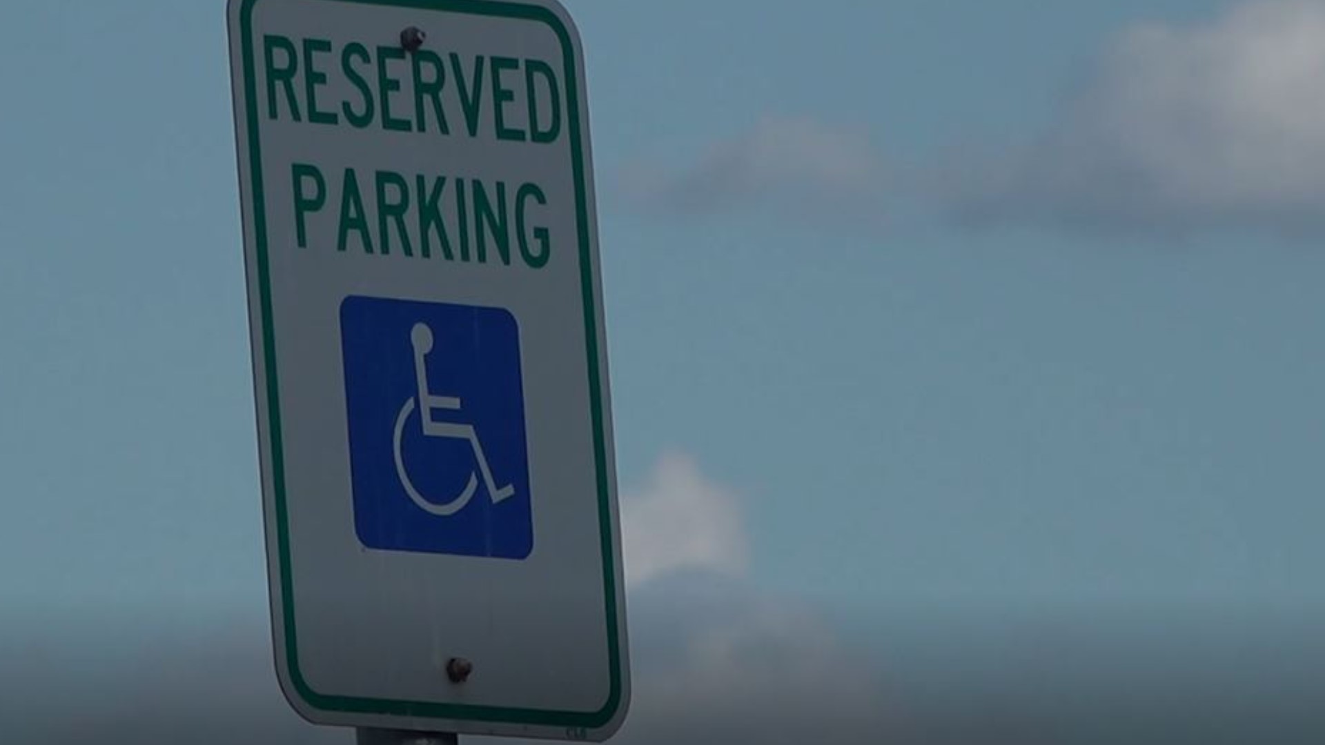 The law says disabled veterans will now have to hang their Americans with Disabilities Act placard in their vehicle in order to park in an ADA spot.