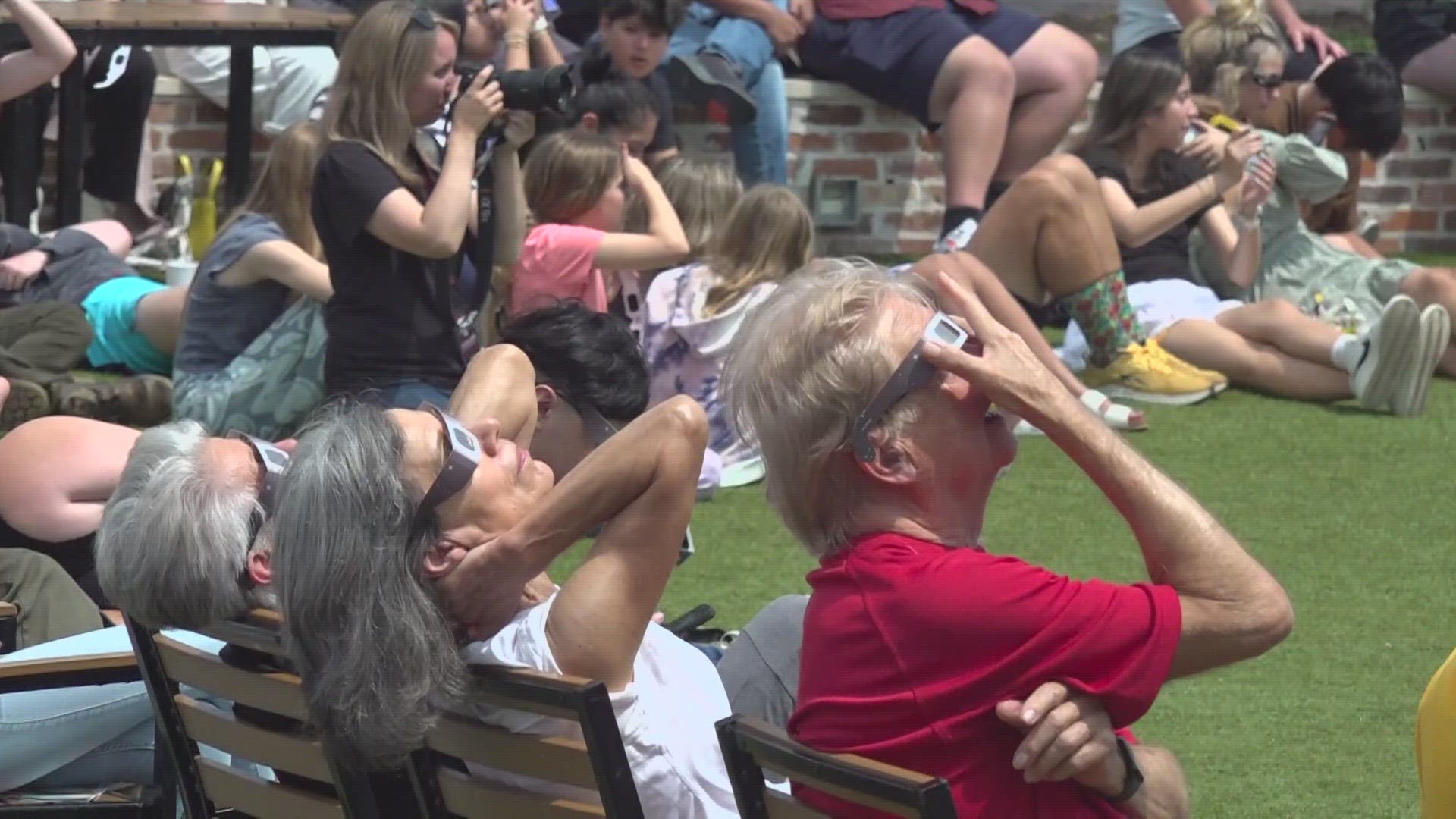 Despite the eclipse only reaching 98% totality in the BCS, a crowd of College Station residents from all walks of life came together to experience the eclipse.