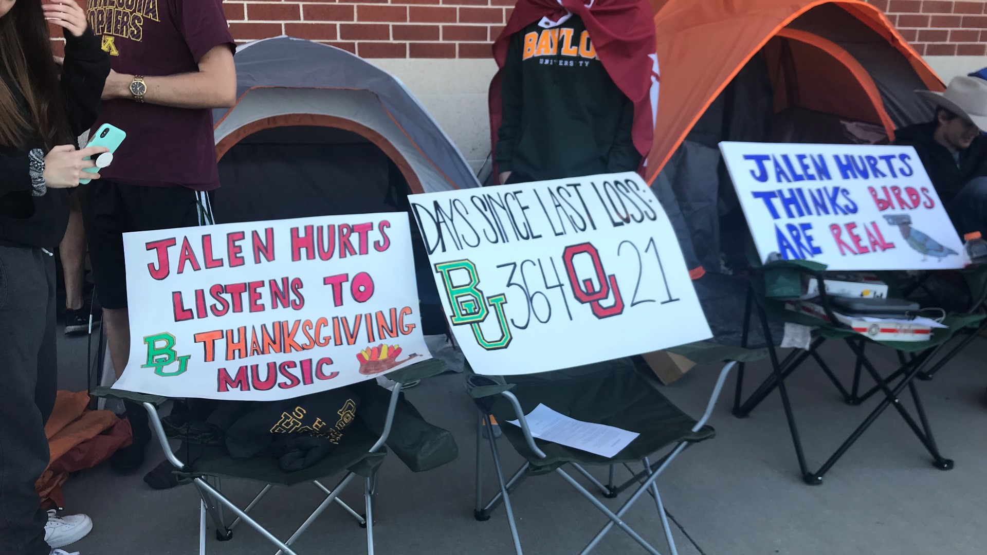 Fans are lining up with signs in hand ahead of College GameDay.