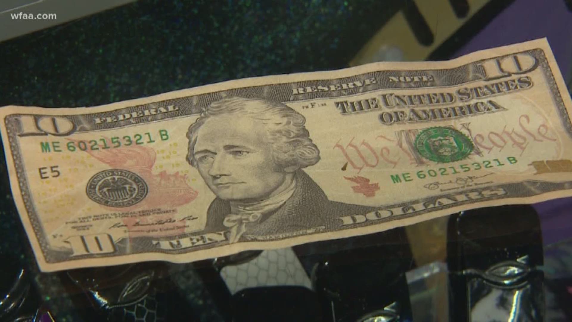 The Community Cancer Association said counterfeit money was used to buy items at its "Helping Hands Social Hour" fundraising event.