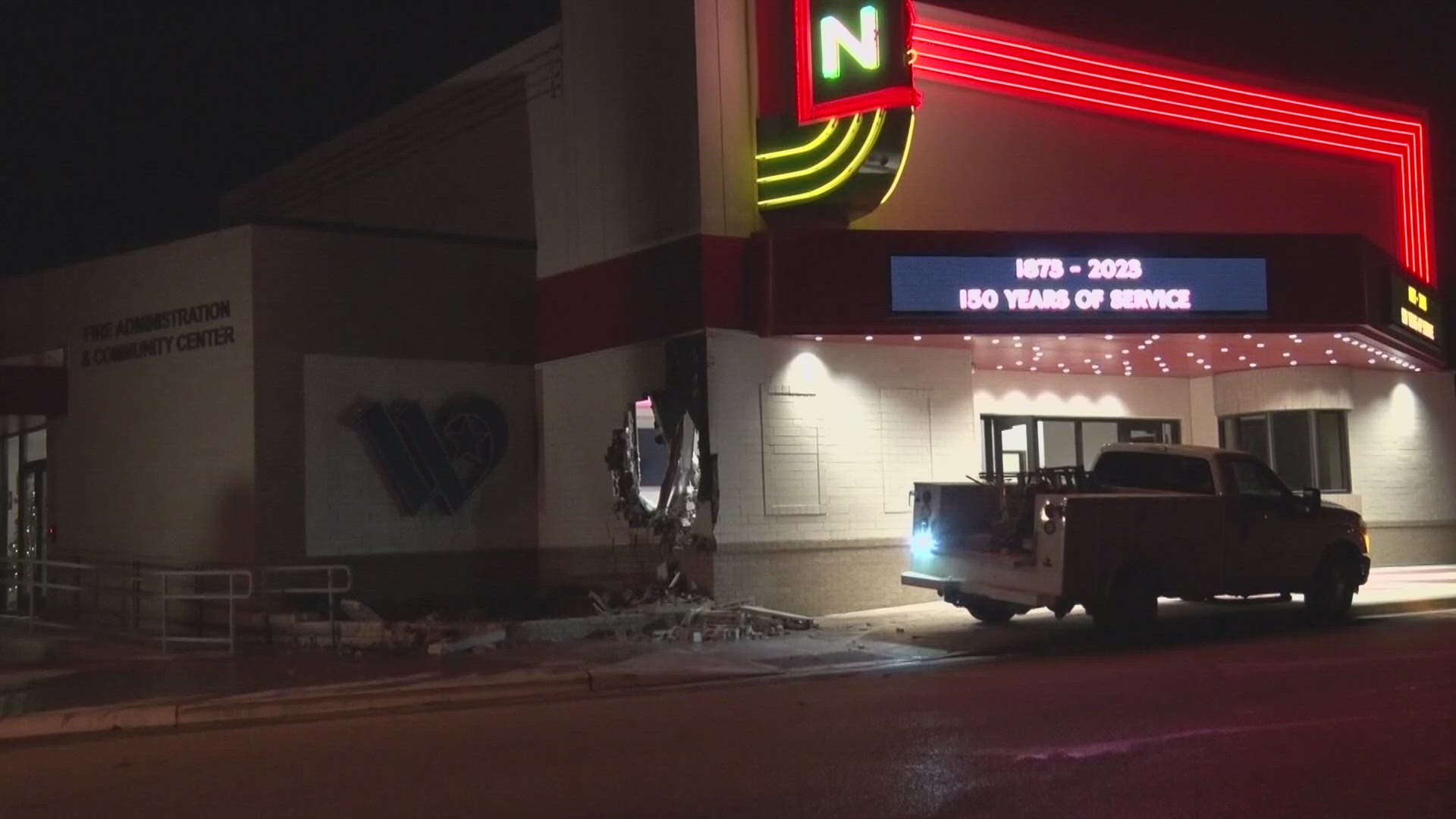 Police said a driver was taken the hospital with minor injuries after crashing into a fire station on Dec. 11.