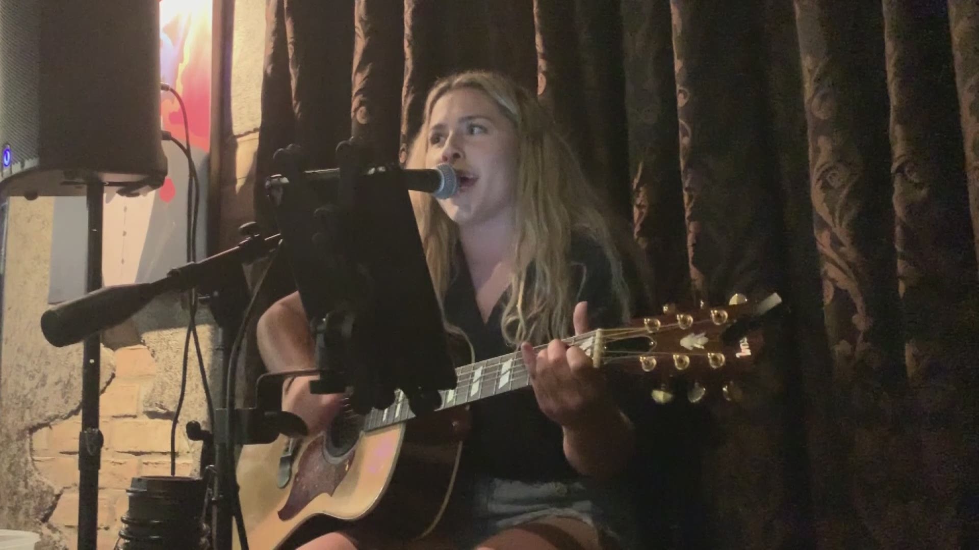 Midway High student and singer Sami Brown, belts out her version of 'You Never Even Called Me By My Name' by David Allan Coe.