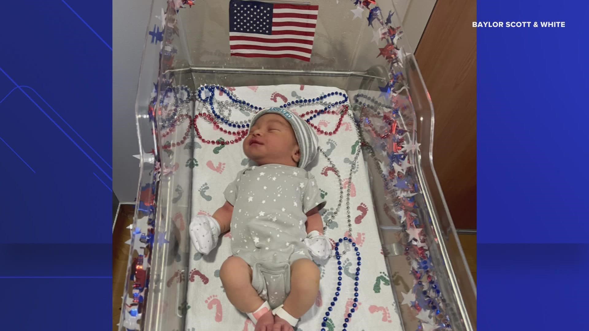 These 12 newborns are "showing off their red, white and blue and are proud to be Born in the USA."