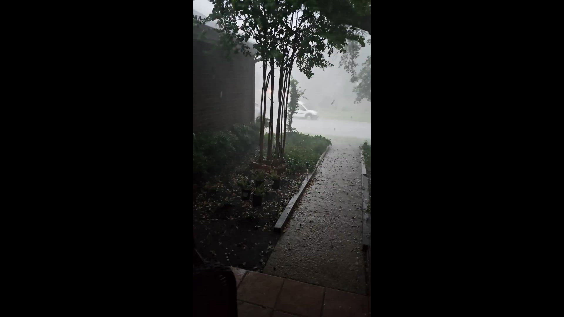 Hail pours off a roof in Harker Heights
Credit: Susan Morgan