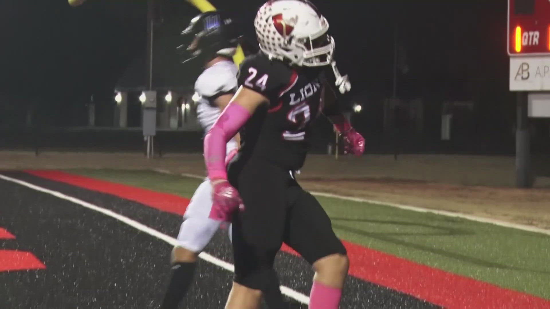 The Lion's Ike Klimchuk celebrates after touchdown against Conroe.