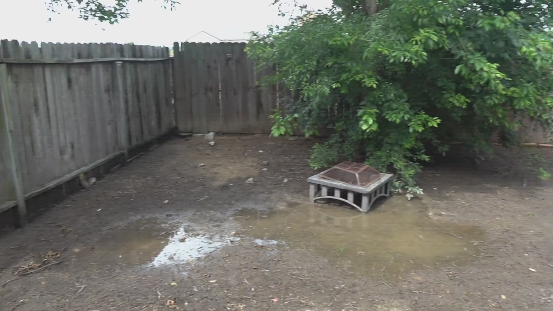 Continuous development around a suburban street is causing drainage to flood nearby residents' backyards.