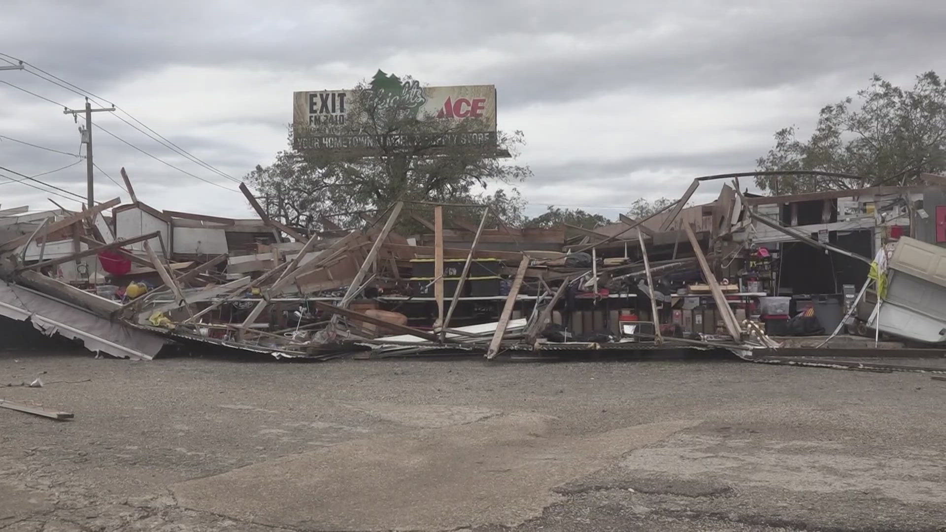 The owner of one of the stores says the only thing standing of his business was a sign that read "Jesus" and is visible from the nearby road.