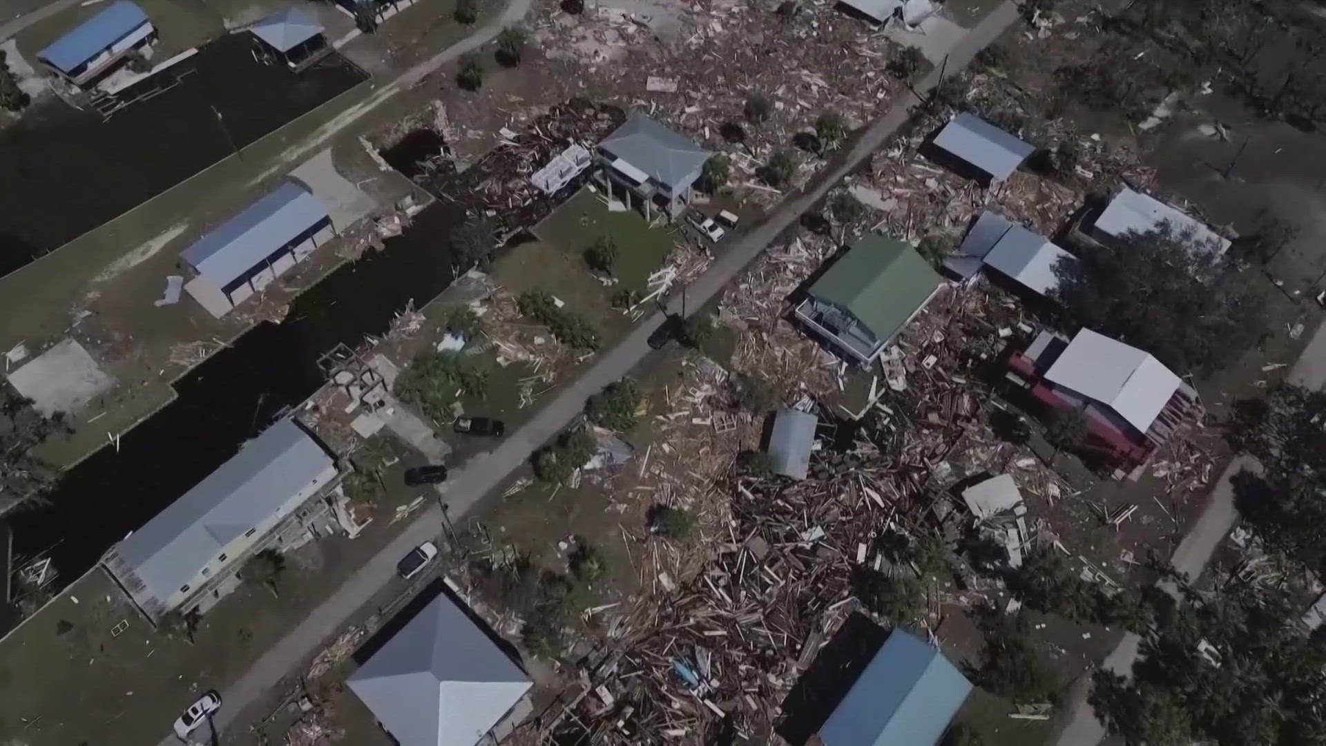 'It doesn't even look real': Over 60 dead, millions without power in ...