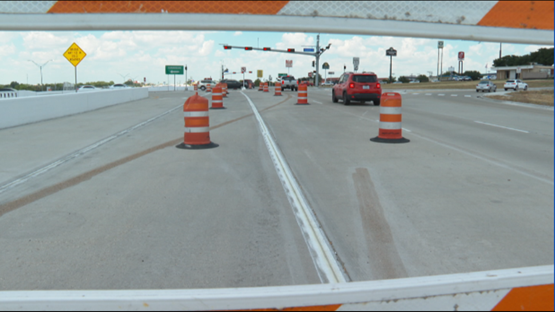 As Temple drivers navigate the new roadway over I-35, there are still closed lanes, unfinished striping and light synchronization issues leading to congested traffic.