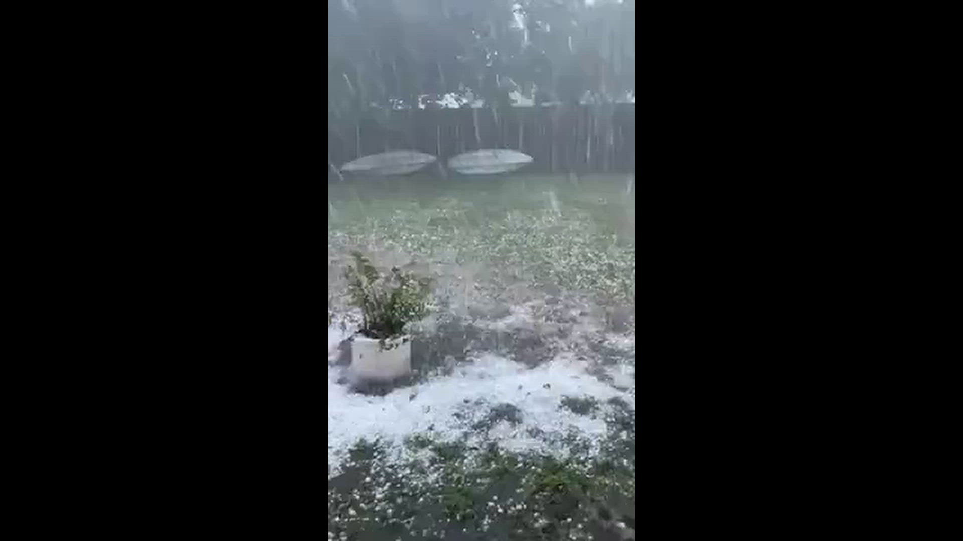 Hail batters a backyard in Morgan's Point Resort, Texas
Credit: Kandyce
