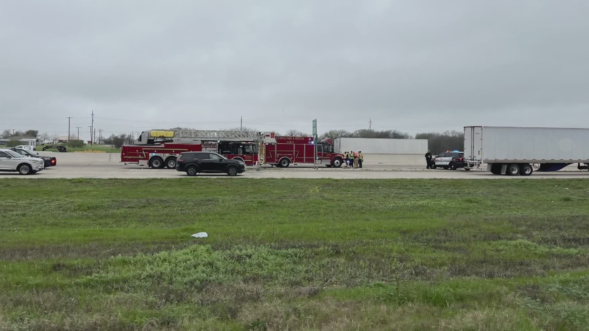 Police say through the initial investigation, it was discovered that the woman's car had been sitting in the middle lane of the highway after it experienced issues.