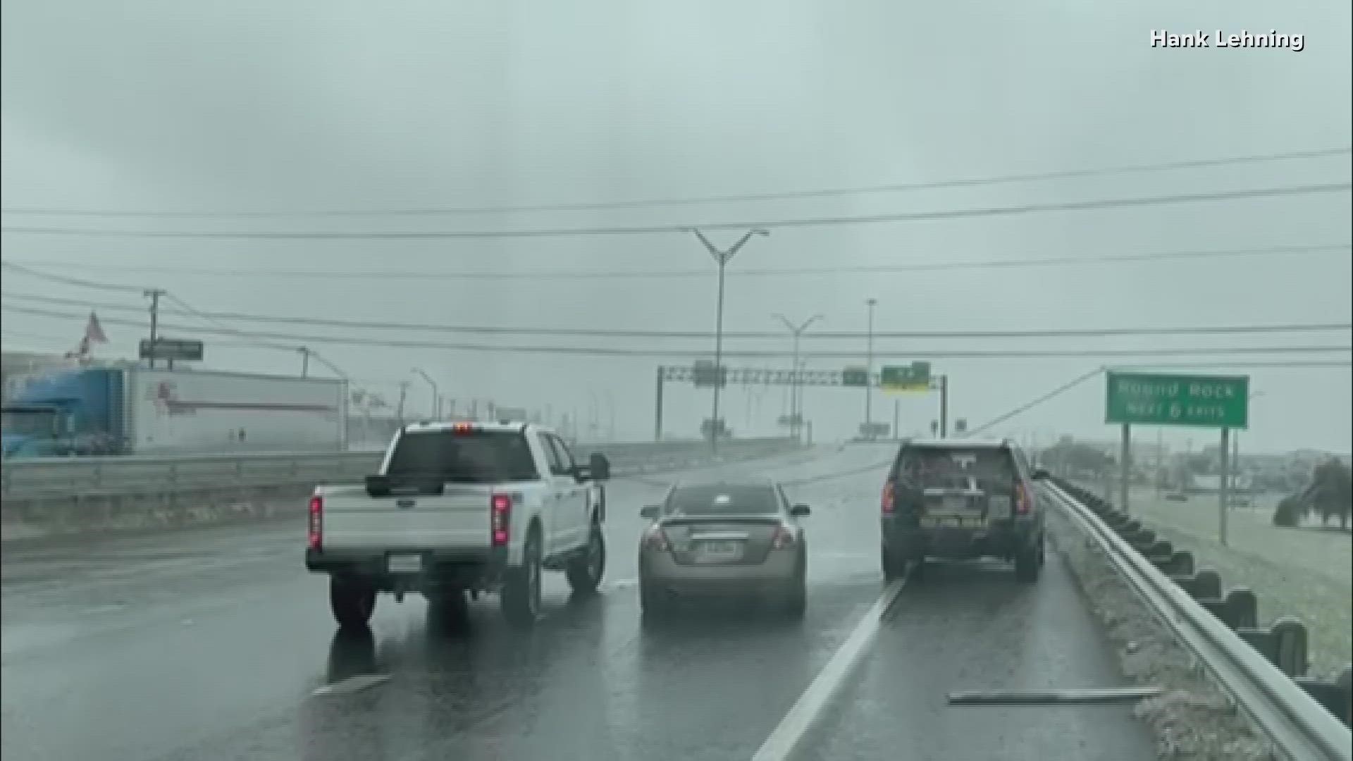 Viewer Hank Lehning shared video while pulled over on the freeway, showing a downed powerline across Interstate 35 north of Austin.