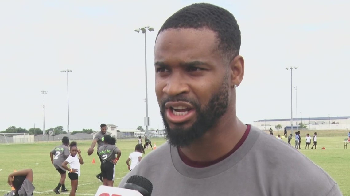 Darius Slay honored with High School jersey during youth football camp