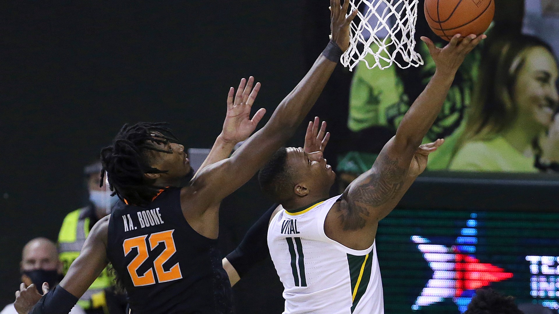 In its first game after clinching its first Big 12 Championship, Baylor showed no signs of a let-down as it held off a late Cowboy run.