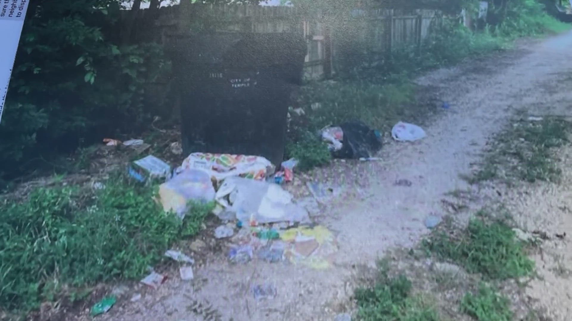 David Rowe said he's dealt with trash piling up in his alley behind his home for years.