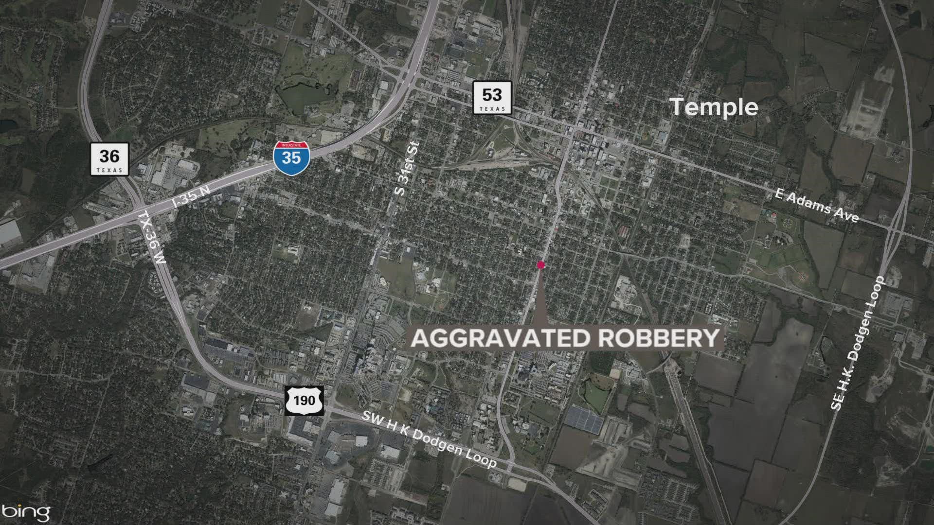 A man with a knife is said to have stolen a women's wallet, according to the Temple Police Department.
