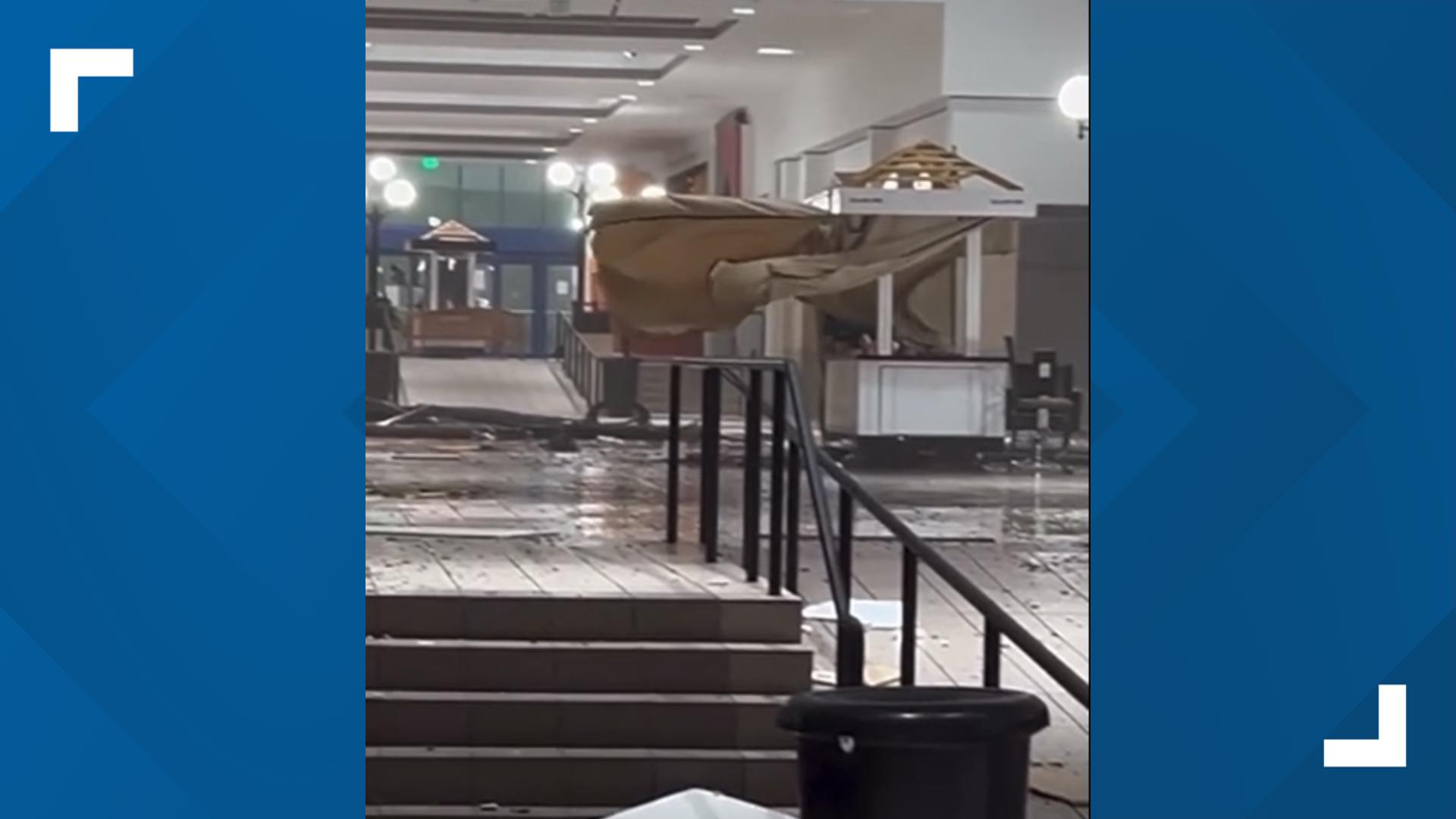 Heavy rain falls inside the Temple Mall during severe storms on May 22