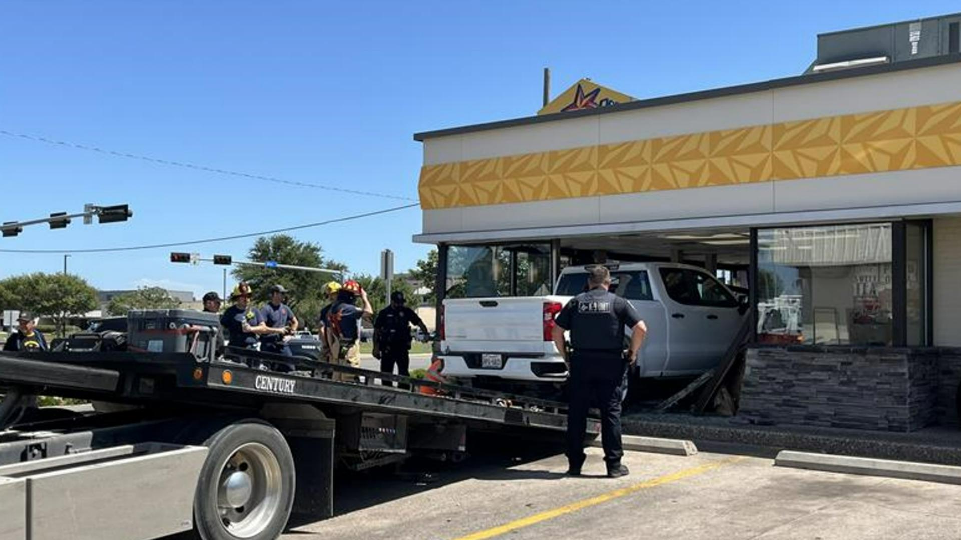 Two people were reportedly injured after a truck crashed into a Temple Church's Chicken on Aug. 2.