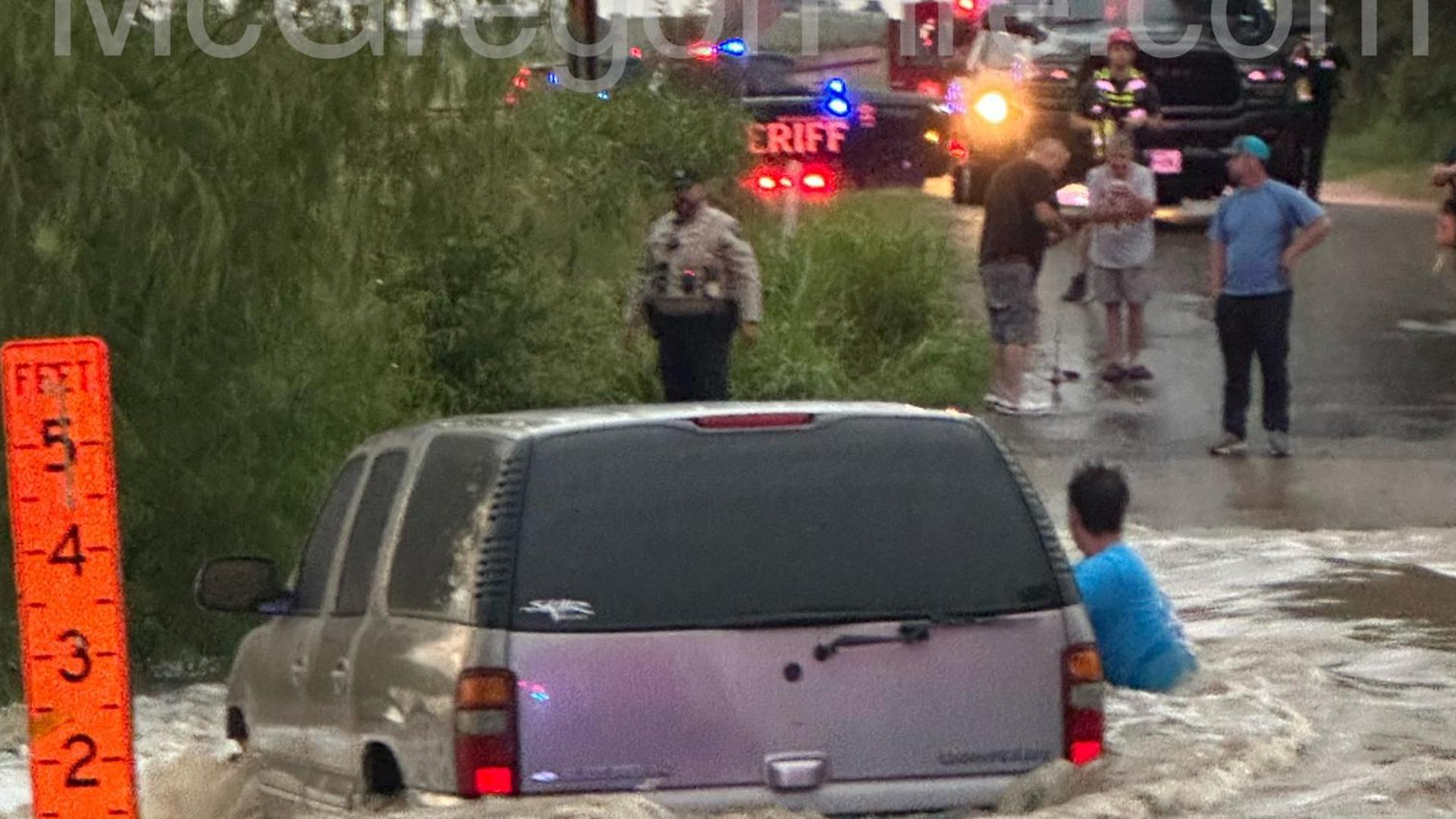 Waco Fire Swift Water Rescue team saves person trapped at low water crossing over Bosque River.