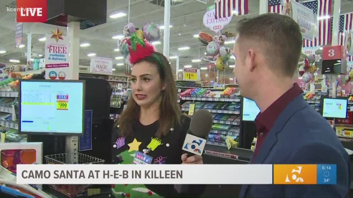 Camo Santa Heidi Alagha tries her hand as HEB cashier