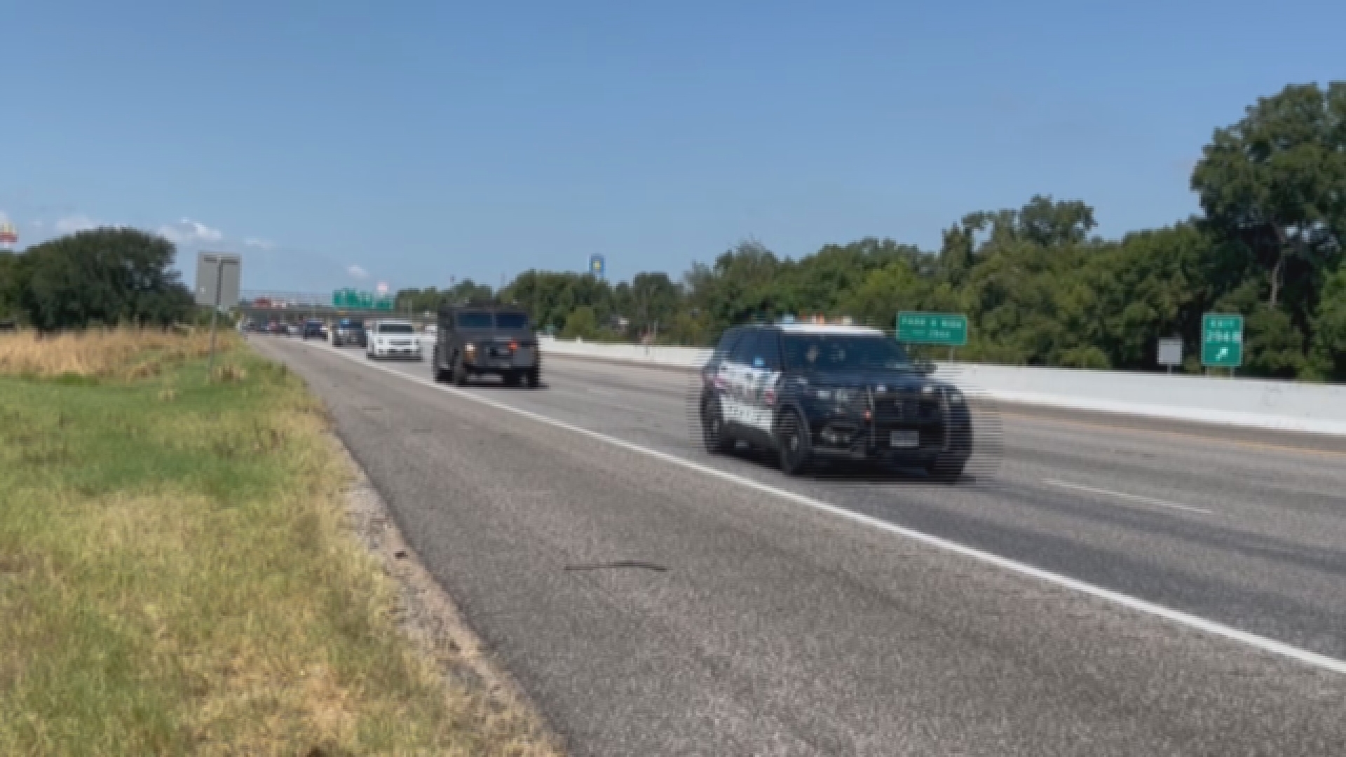 Procession honoring Officer Toalua "Charlie" Aumua as his body is moved from Georgetown to Temple.
