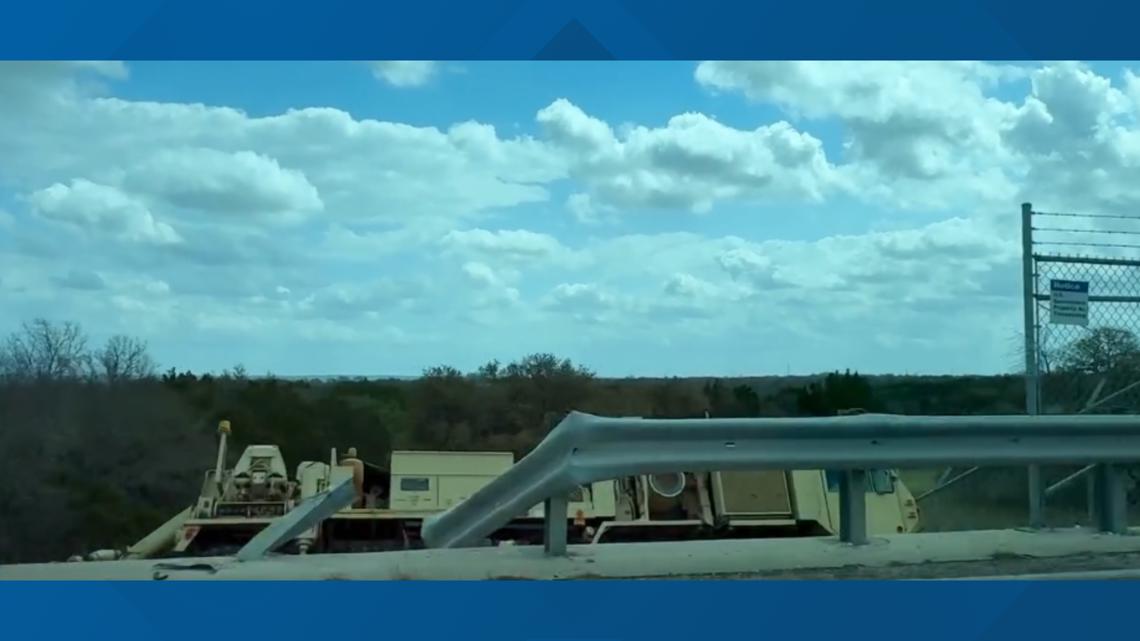 Military truck crashes through guardrail on Belton Dam