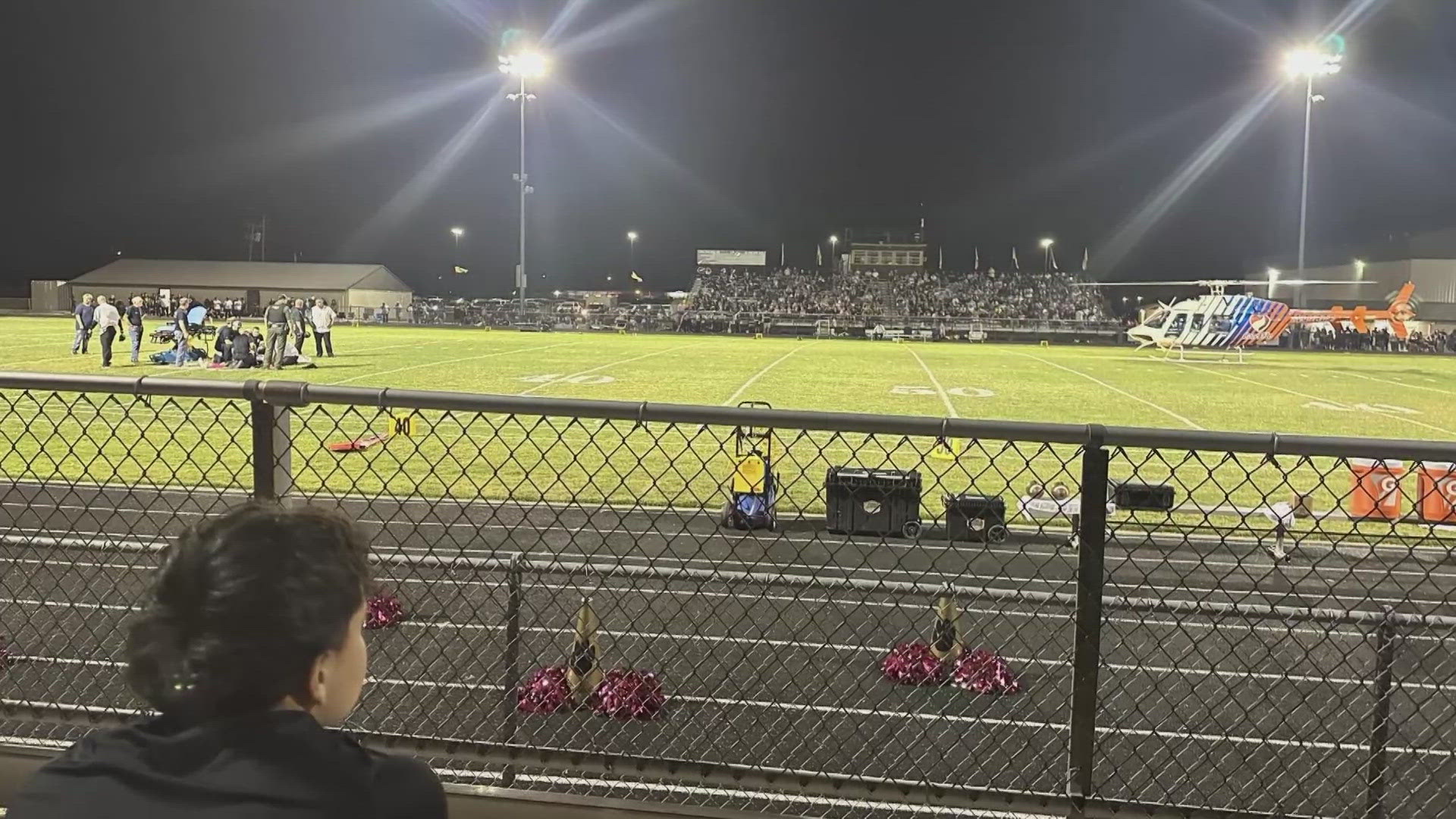 A player stopped moving after a tackle in the second quarter.