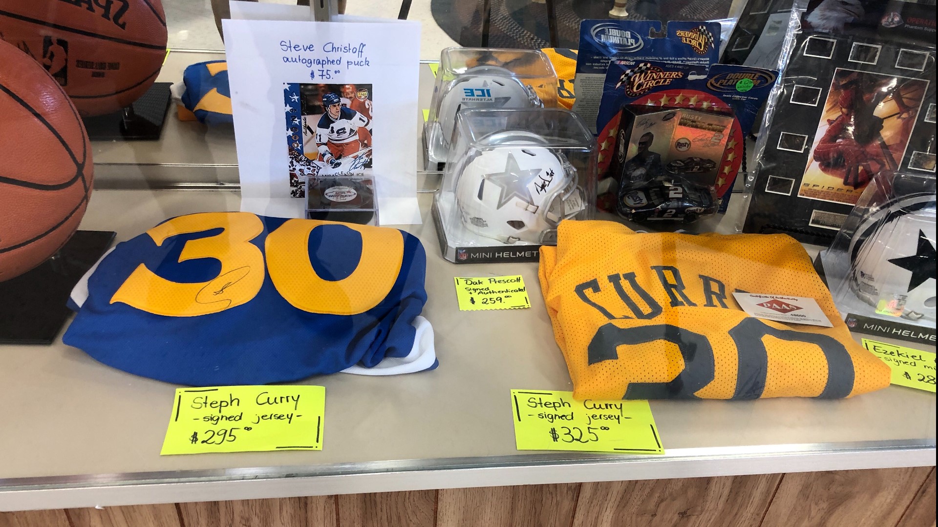 Two signed Steph Curry jerseys were stolen from a display case in the store, but later were given back with an apology note.