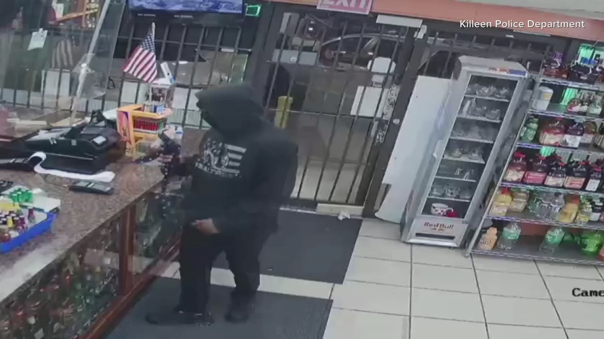 Security footage shows an armed man walking into a store on Hallmark Avenue and demand money.