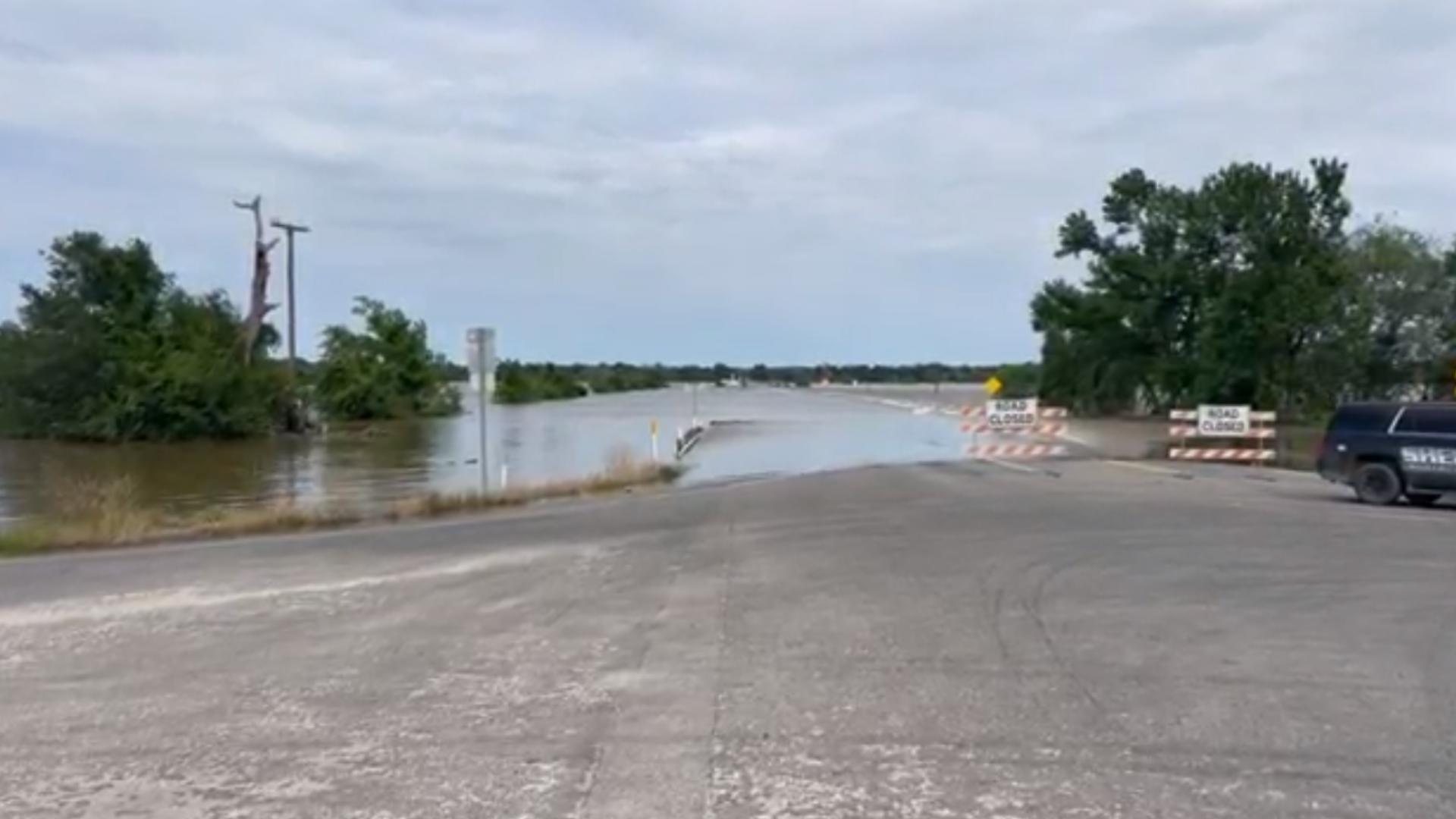 The Navasota River floods over Highway 7 in Robertson County.