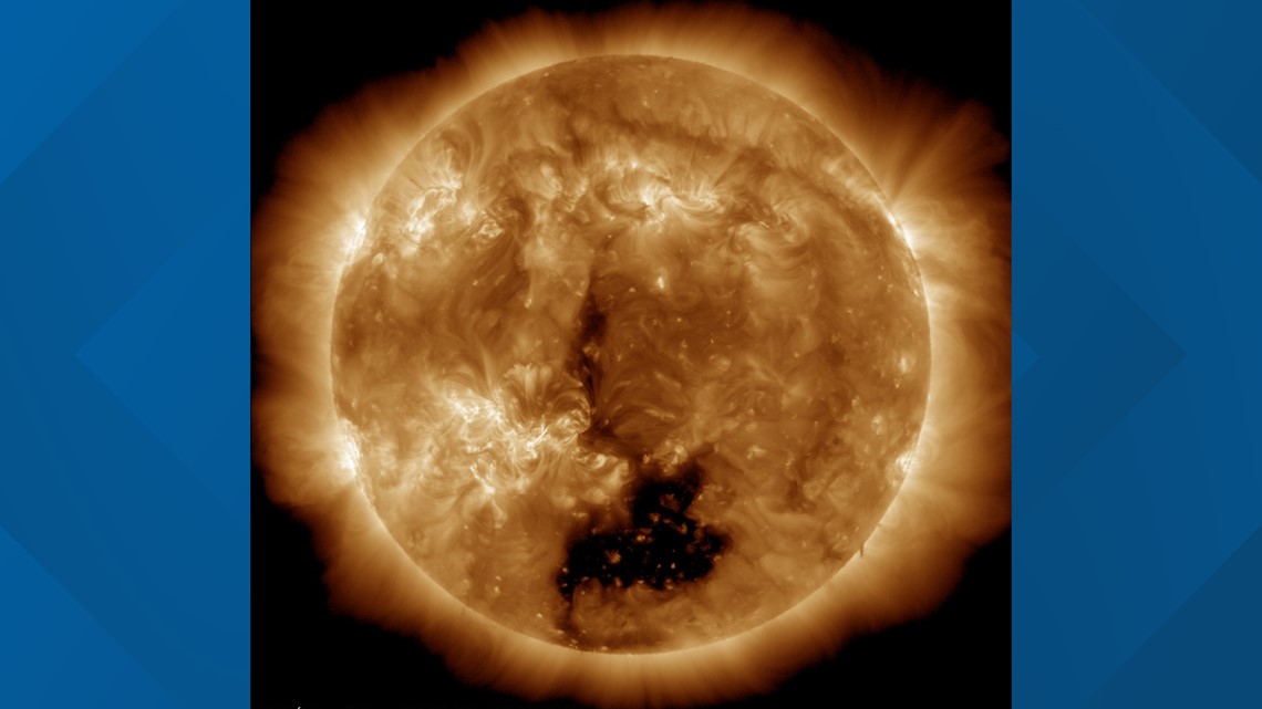 Massive hole in the Sun