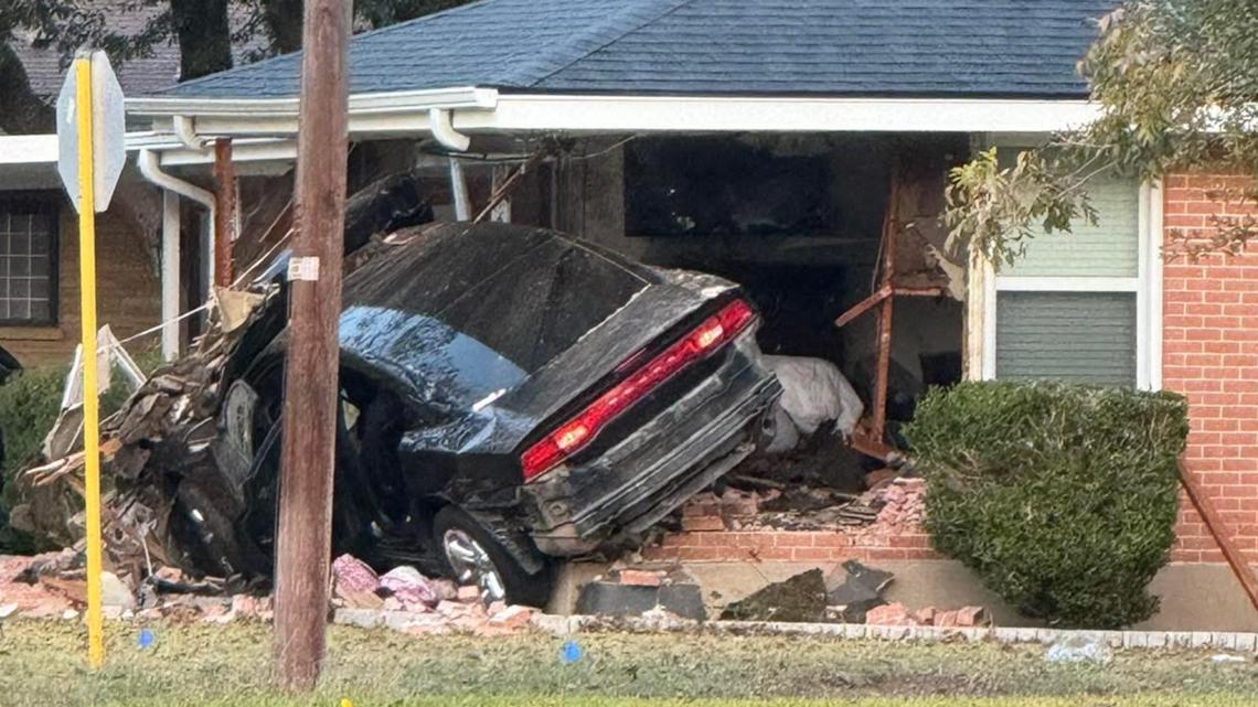 Car Crash Into House