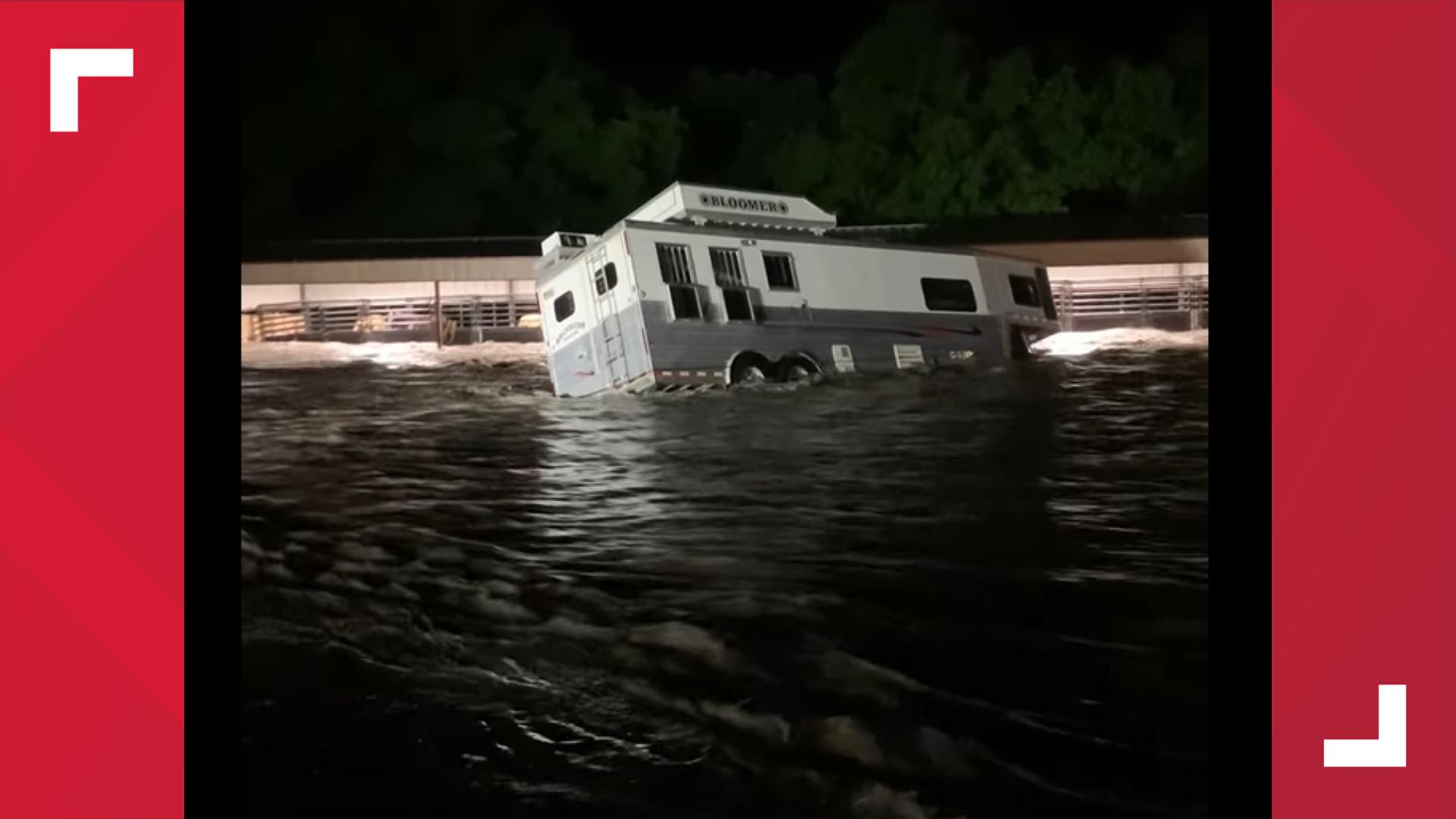 Flood waters overtake horse trailer at Circle T Resort in Hamilton, Texas.