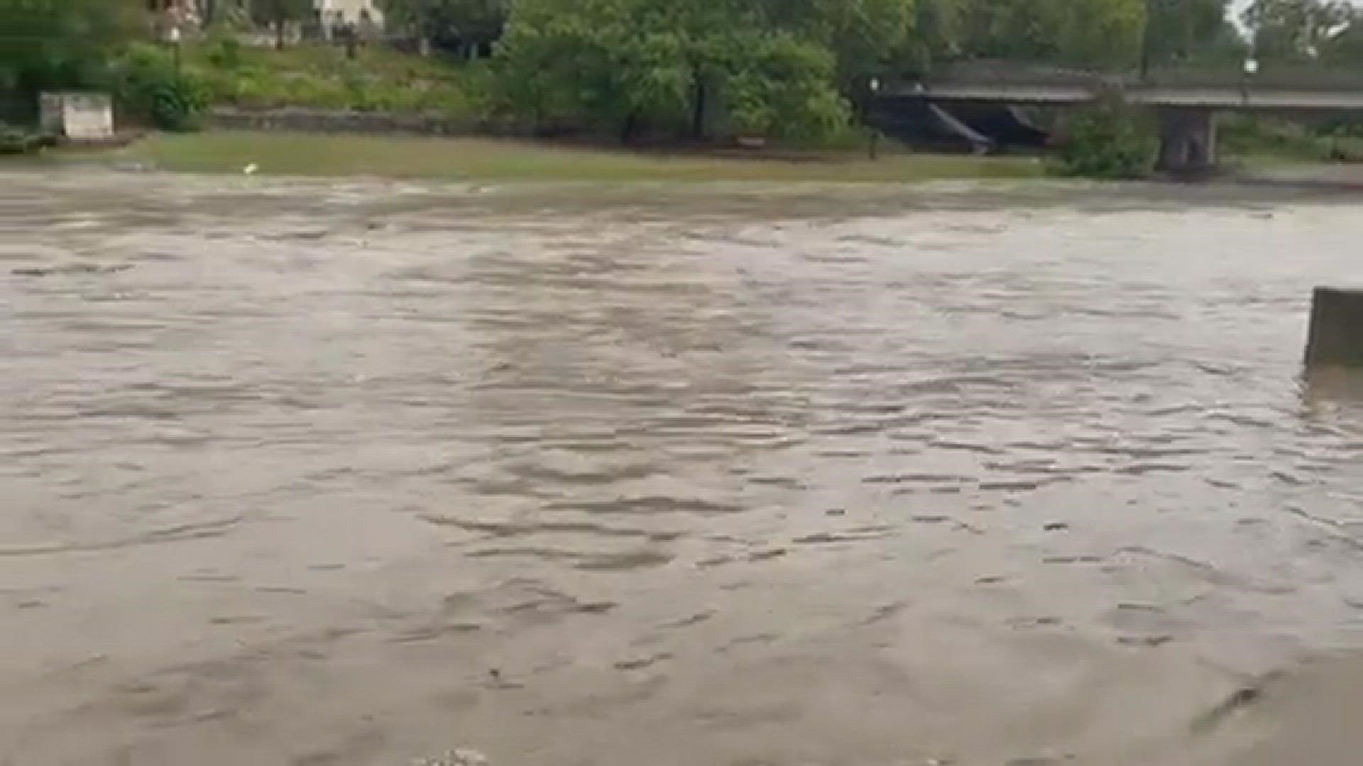 Waters rush down Nolan Creek in Belton after heavy rains