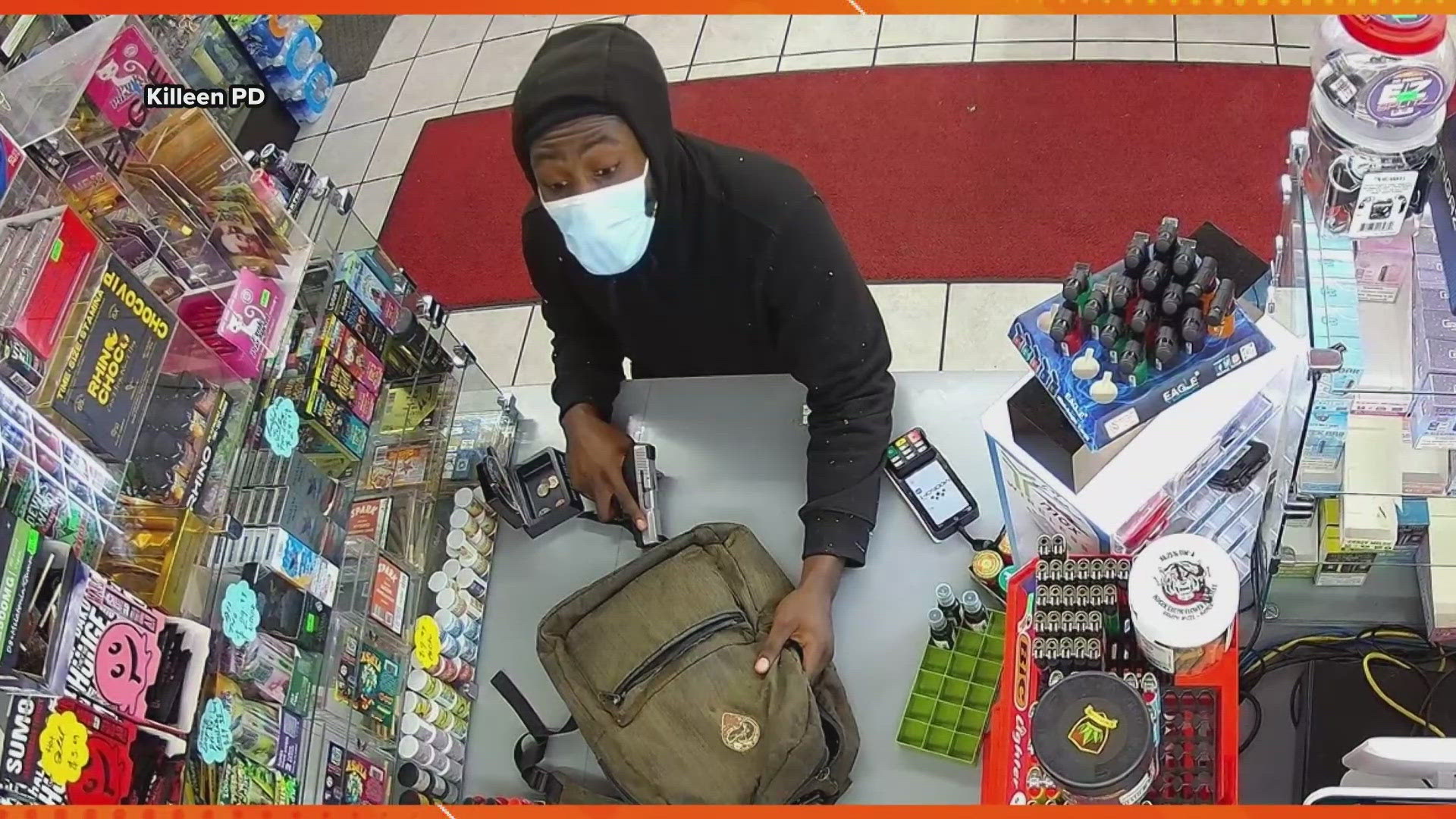 The suspect robbed two businesses.