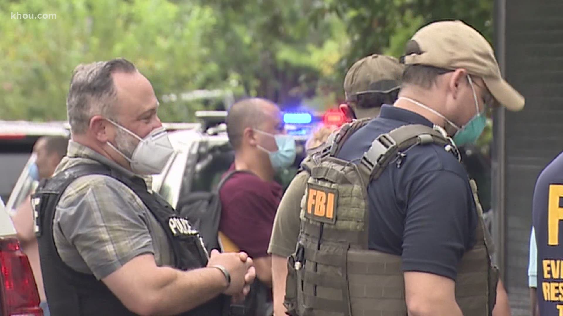 FBI agents shot and killed a man wanted on child porn charges Friday morning in southeast Houston.