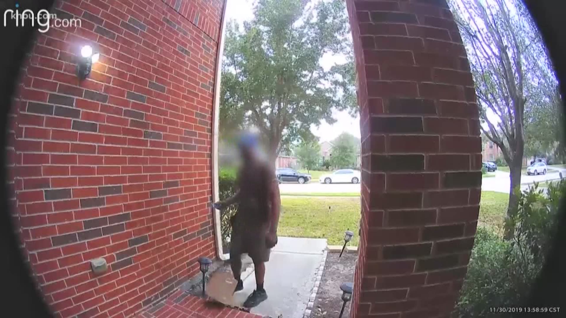 A UPS driver was caught on a Ring doorbell camera kicking a woman's package after he dropped it. Inside the package was a high-dollar camera lens.