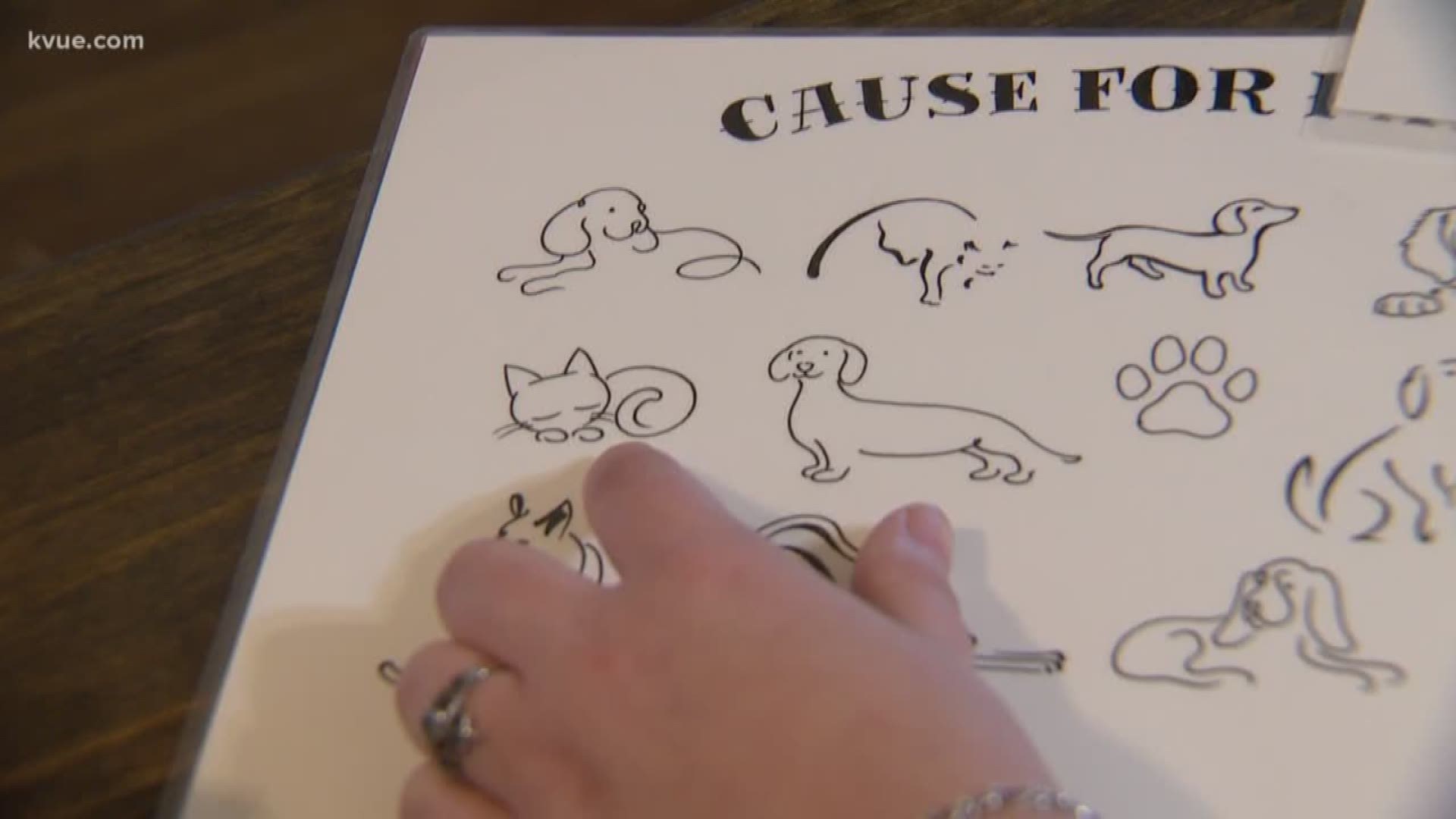 An Austin tattoo shop owner is using his skills with ink -- for *animals in our city -- that need help.
