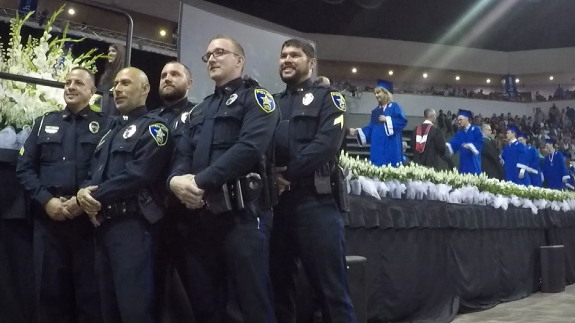 Marble Falls police officers step in after graduate loses