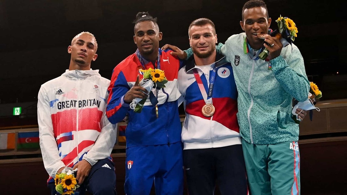 Boxer regrets putting silver medal in his pocket at podium ceremony