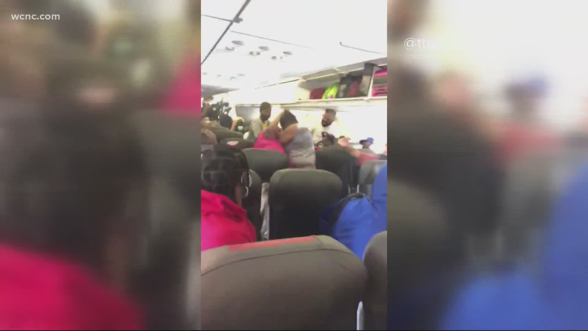 The plane was about to take off for Charlotte when passengers got into a fight over the airline's face mask policy.