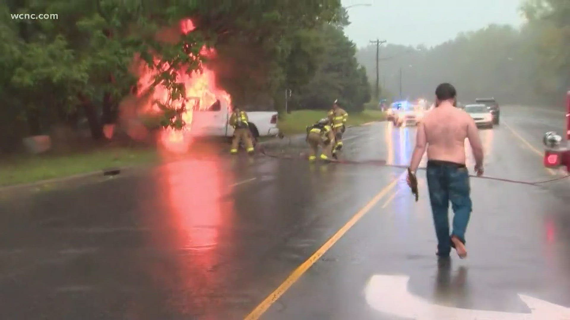 Good Samaritans jumped into action and pulled a man from his truck after it crashed and burst into flames in Wesley Chapel.