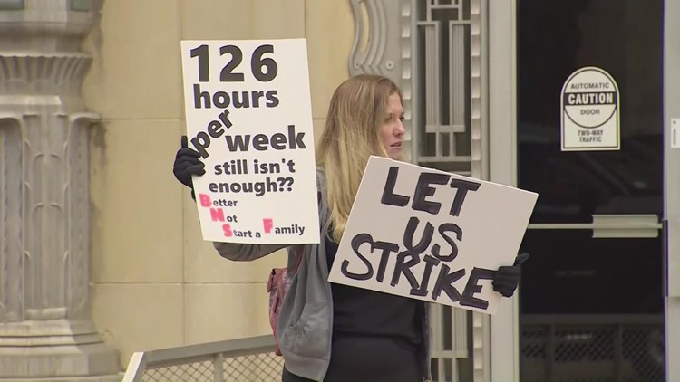 BNSF workers, families protest over company lawsuit