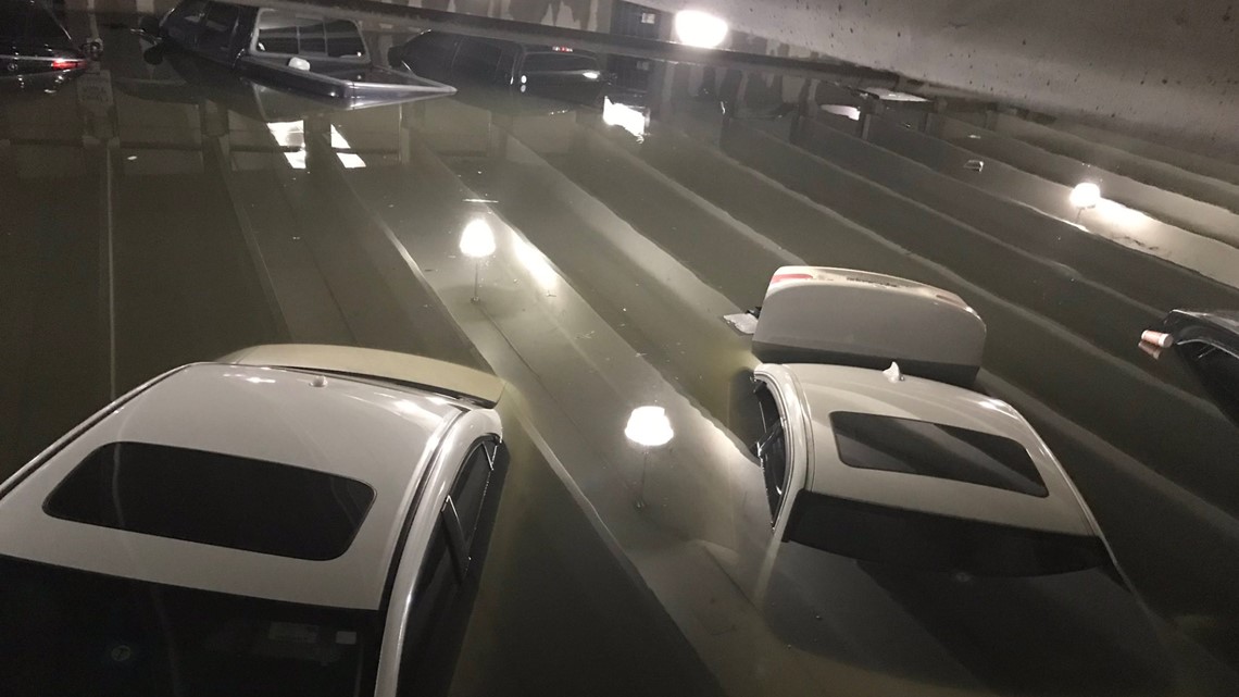 Flooding leaves vehicles underwater at Dallas Love Field parking garage