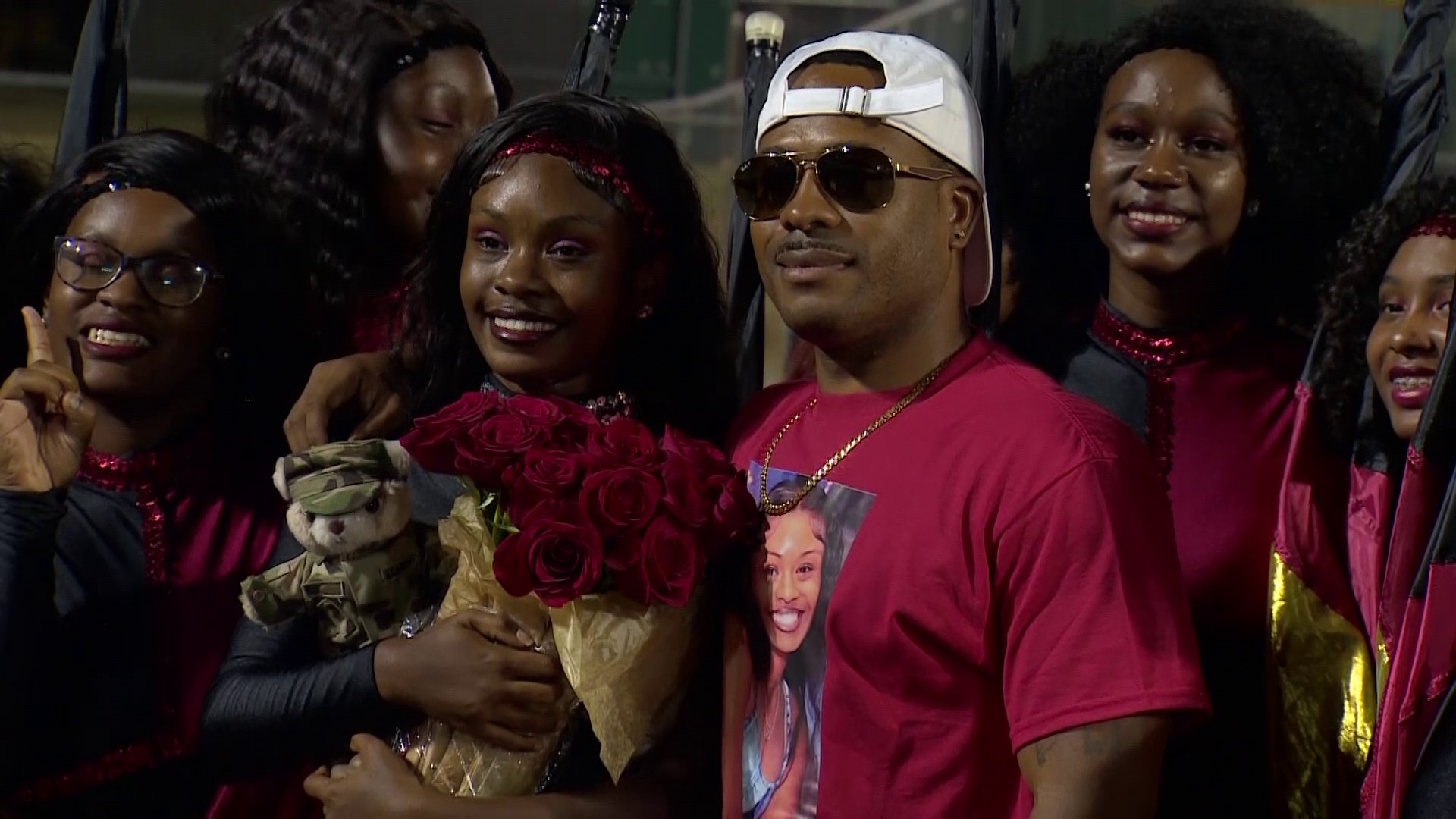 At Cedar Hill's Friday night football game, Sgt. 1st Class Kathan Morgan surprise-reunited with his daughter Cassara after her dance team wrapped their halftime show