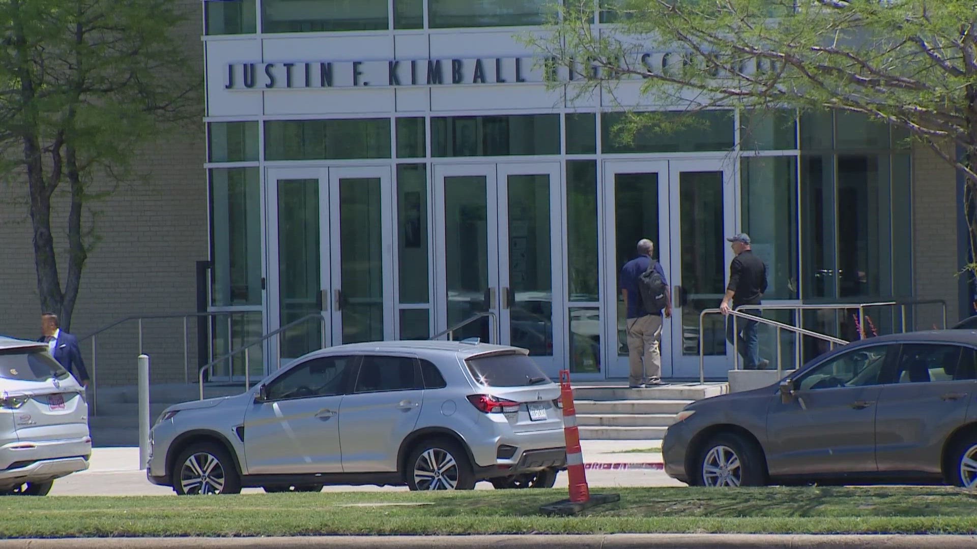 A hall monitor accused of hitting a student says video circulating on social media doesn't show the entire incident. Dallas ISD police are investigating.