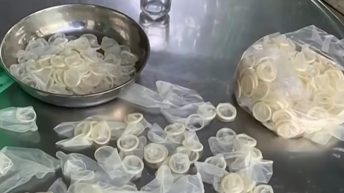 Inspectors find more than 300,000 used condoms being packed for resale
