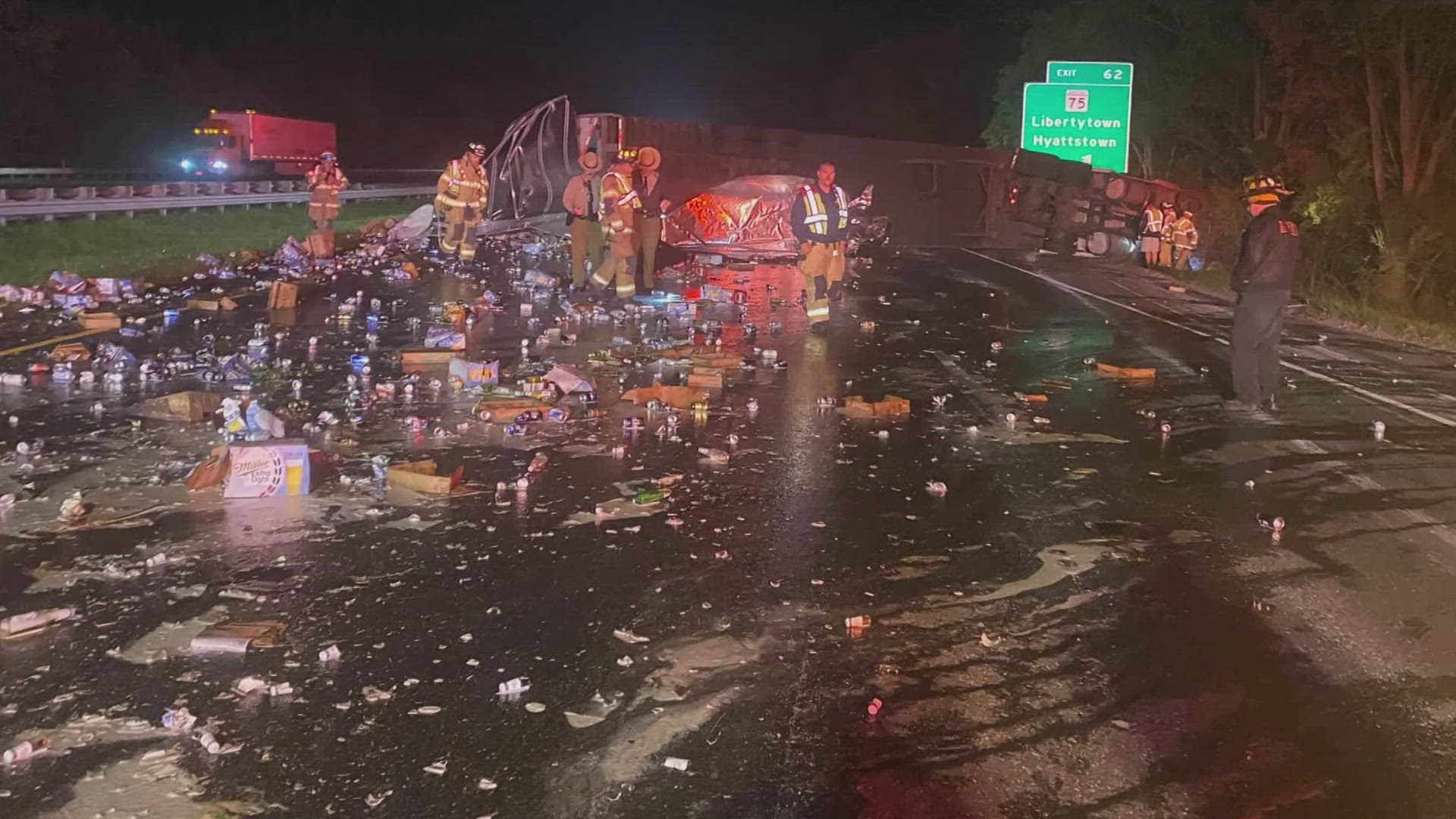 Photos shared by Frederick County Fire and Rescue show cases of beers piled up on the road and with cans and bottles strewn about the road.